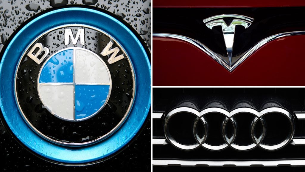BMW, Tesla och Audis loggor.